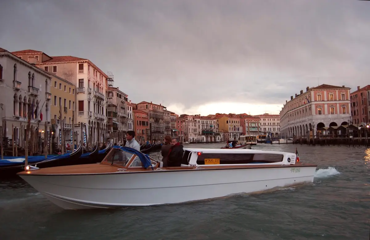 Water taxi speeding along the Grand Canal